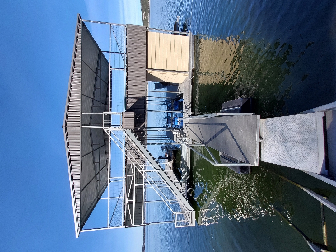 Two story custom boat dock built by Spillar Lakefront Services on Lake Travis